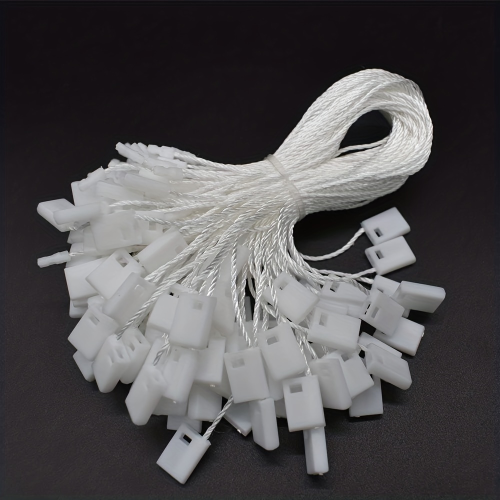 White hang tag string with plastic locker HTS012 
