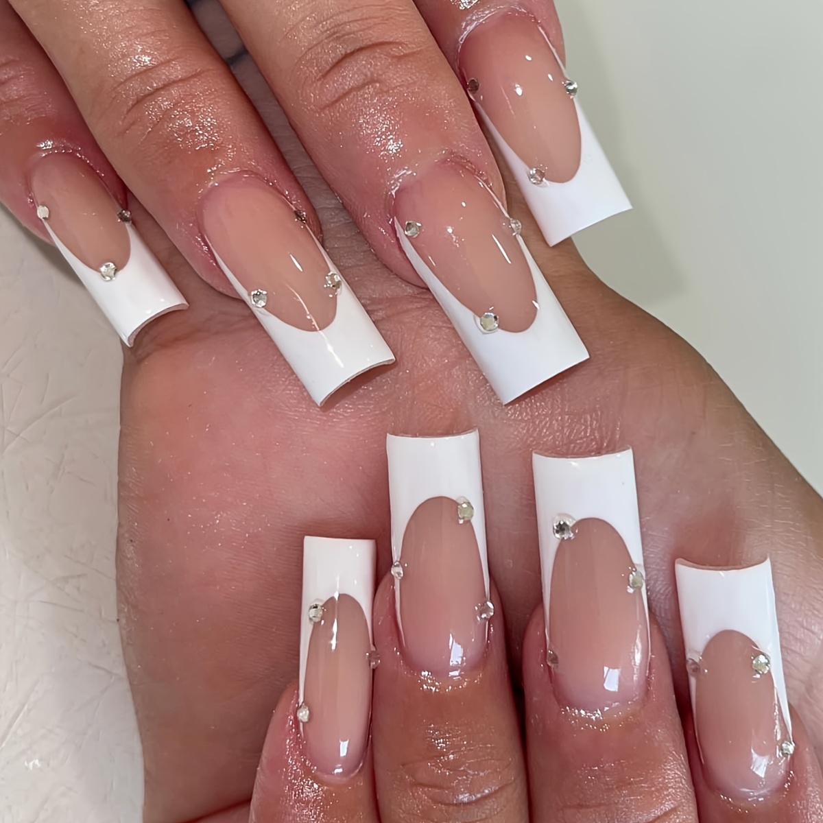 White long square nails with blue rhinestones  Nails design with  rhinestones, Bling acrylic nails, Long square acrylic nails
