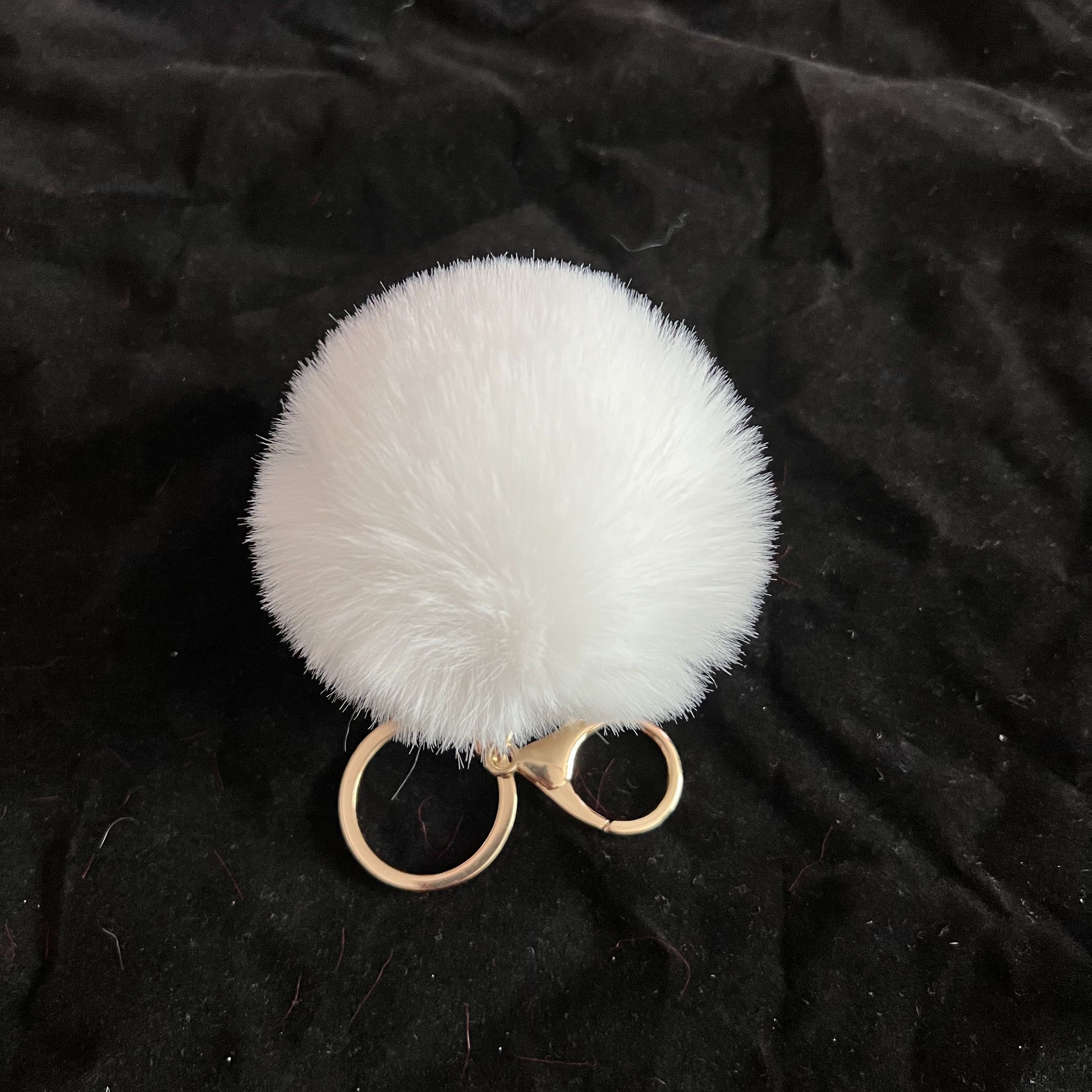 Big puff ball on sale keychain