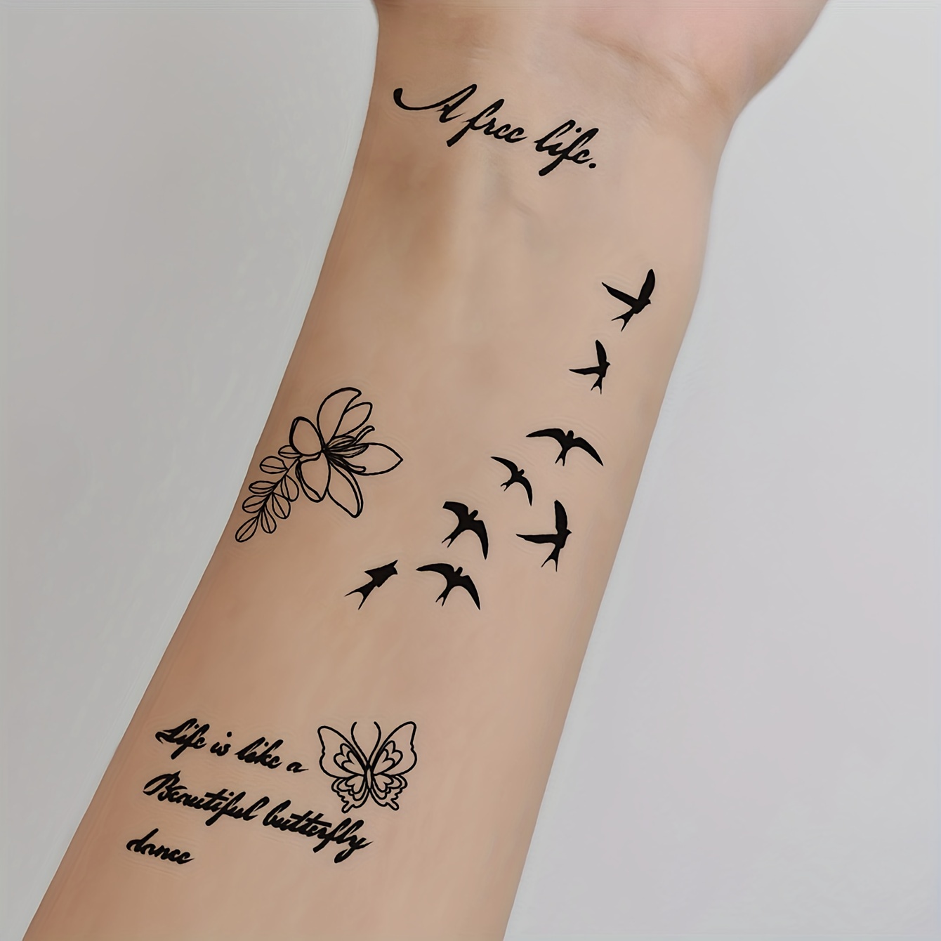 the word free tattoo