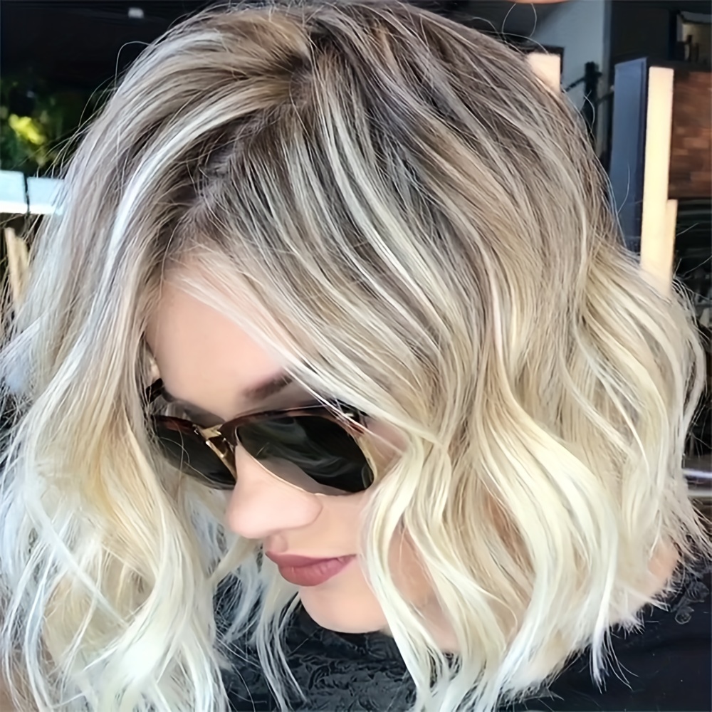 platinum blonde hair with brown roots