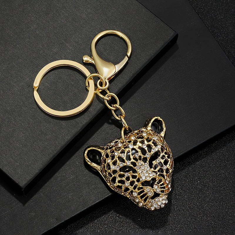 Image of A Fashionable European And American Alloy Hollow Double Additions Two-color Domineering Leopard Head Inlaid With Rhinestones Personalized Men's And Women' Fashion Keychain Pendant