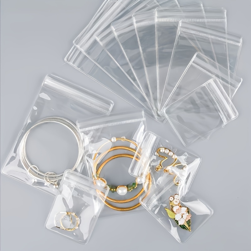  DOERDO 100 Pieces PVC Clear Jewelry Anti Oxidation Zipper Bag  Antitarnish Plastic Bags for Packaging Jewelry Earrings Rings Cellophane  Wrap, 5 x 7cm, 2 x 2.7 inch : Health & Household