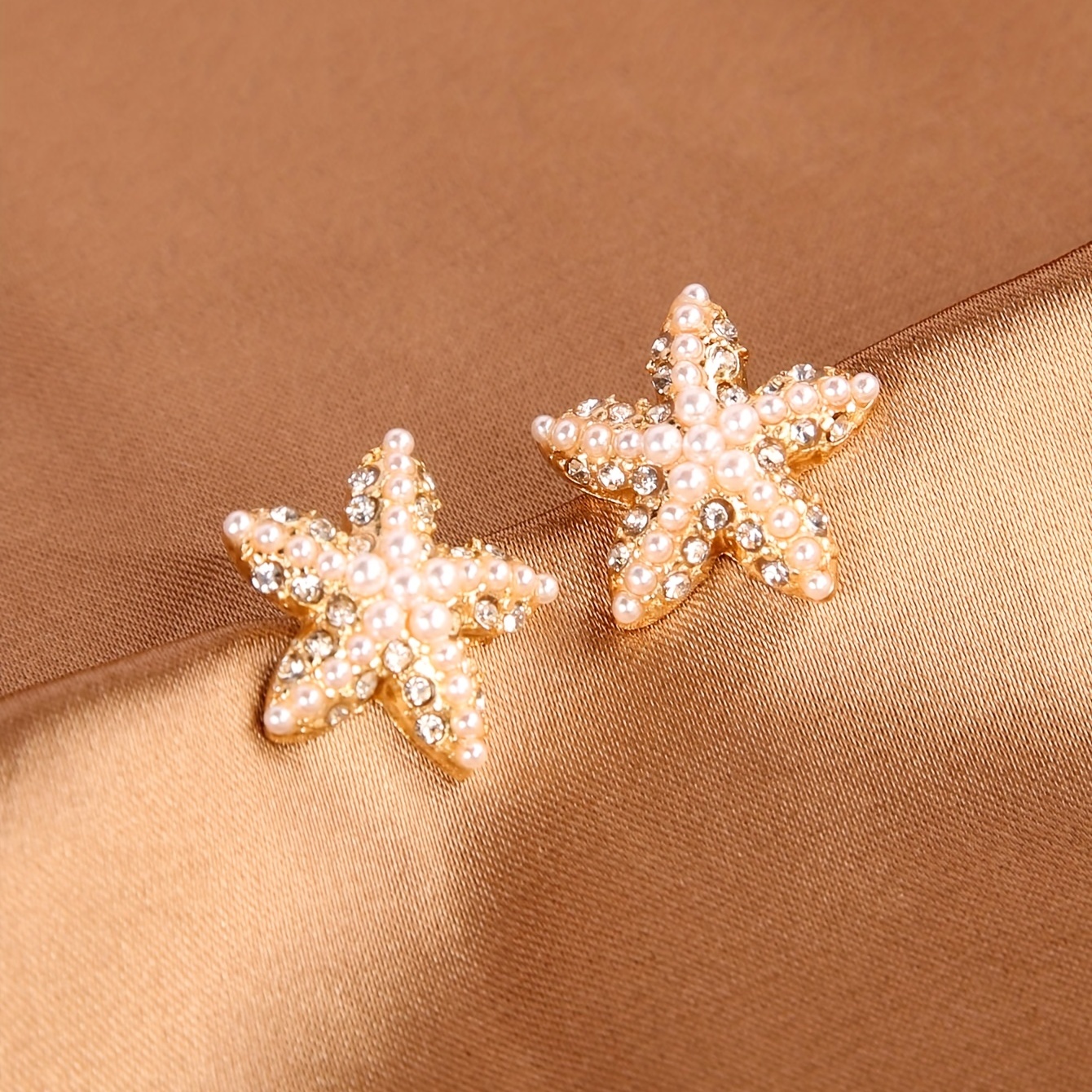 a pair of stylish and minimalist sweet small synthetic pearl   earrings for women