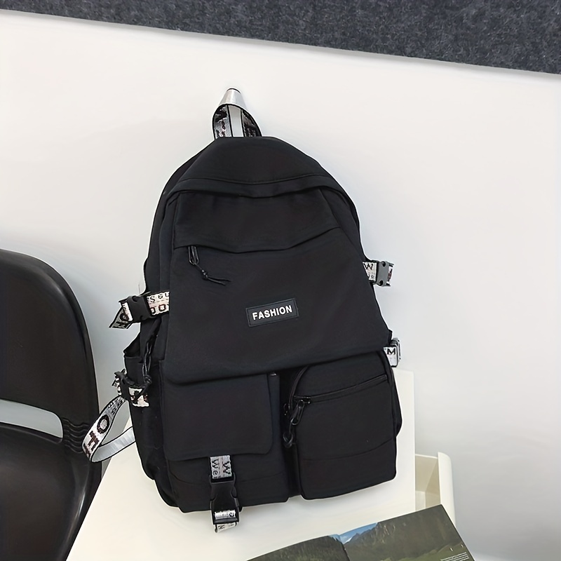 M black multi-pocket backpack