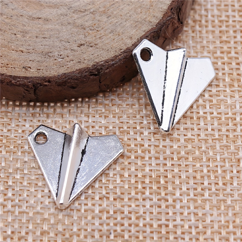 Paper clearance plane charm