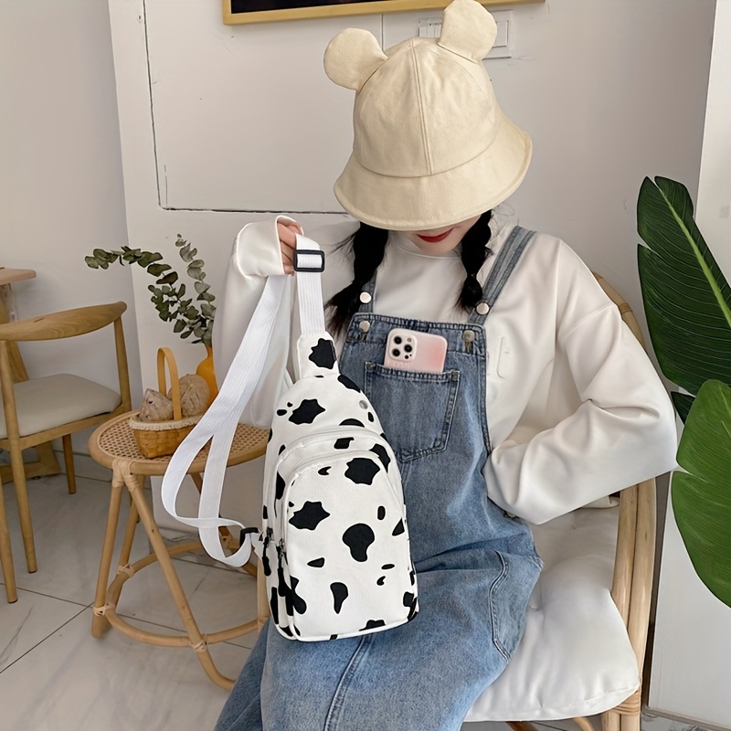Travel Fashionably with Most Popular Cow Print Faux Leather Bag