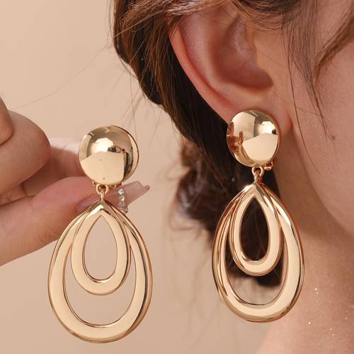 1 pair of metal wind exaggerated fashion ear clip on hypoallergenic hollow water drop high quality earrings suitable for womens daily and prom party wear