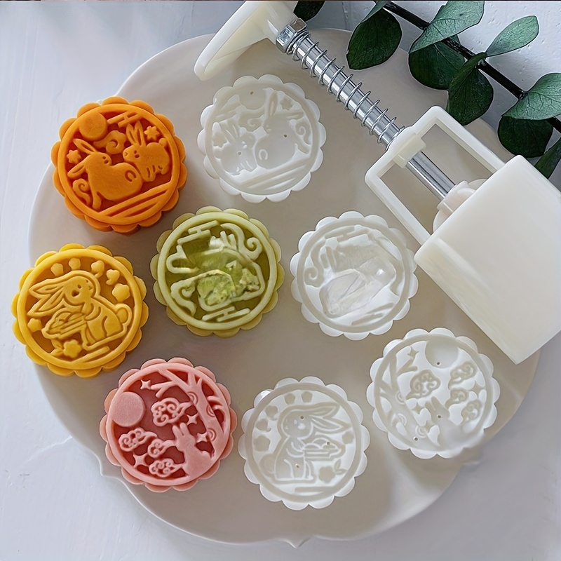 Premium Photo | Midautumn festival traditional food concept beautiful moon  cake on black slate table with tea pastry mold flower top view flat lay  copy space