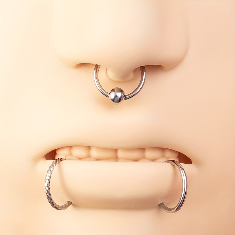 Septum piercing and hot sale nose hoop