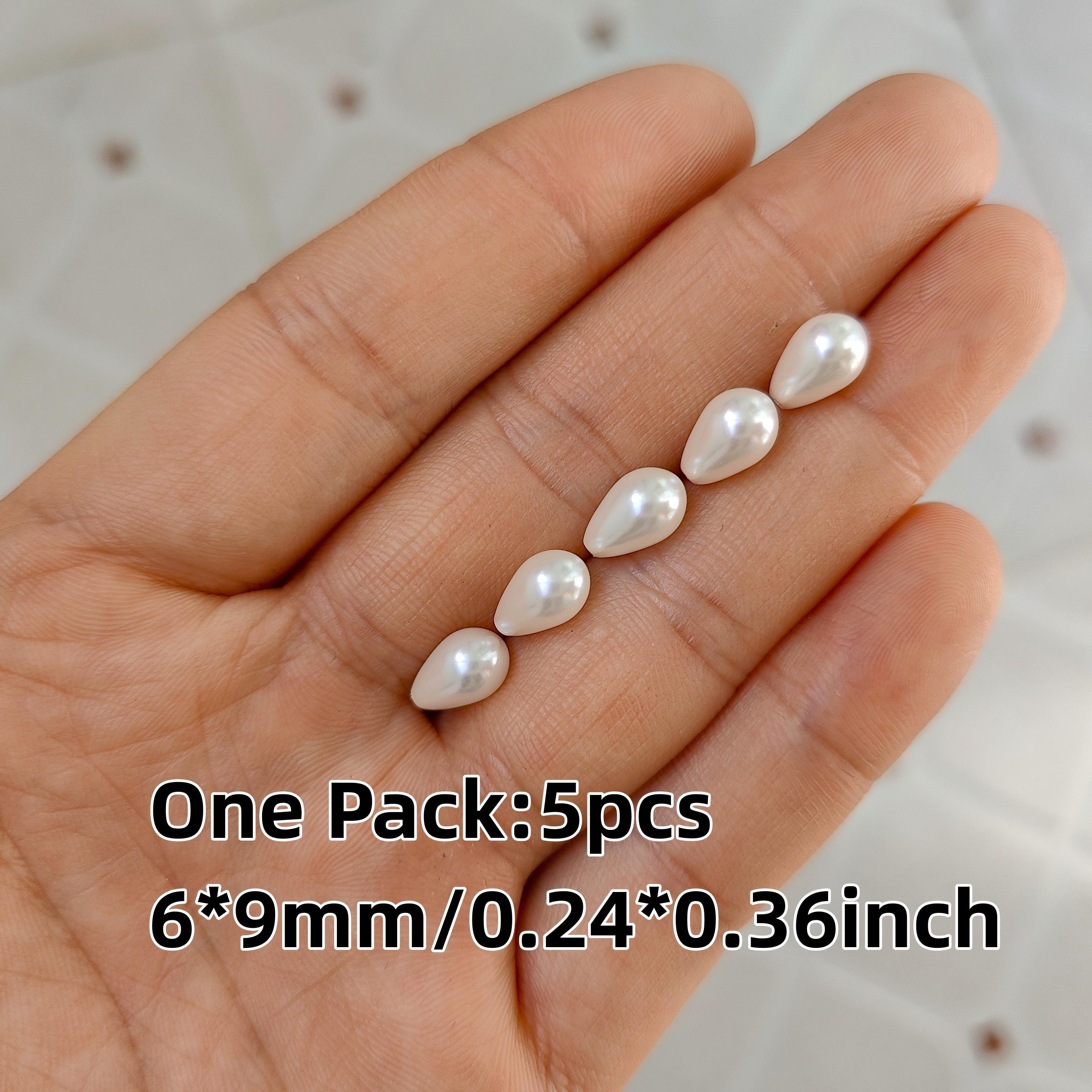 15 In Strand of 26X35 MM Bleached Mother of Pearl Teardrop Beads