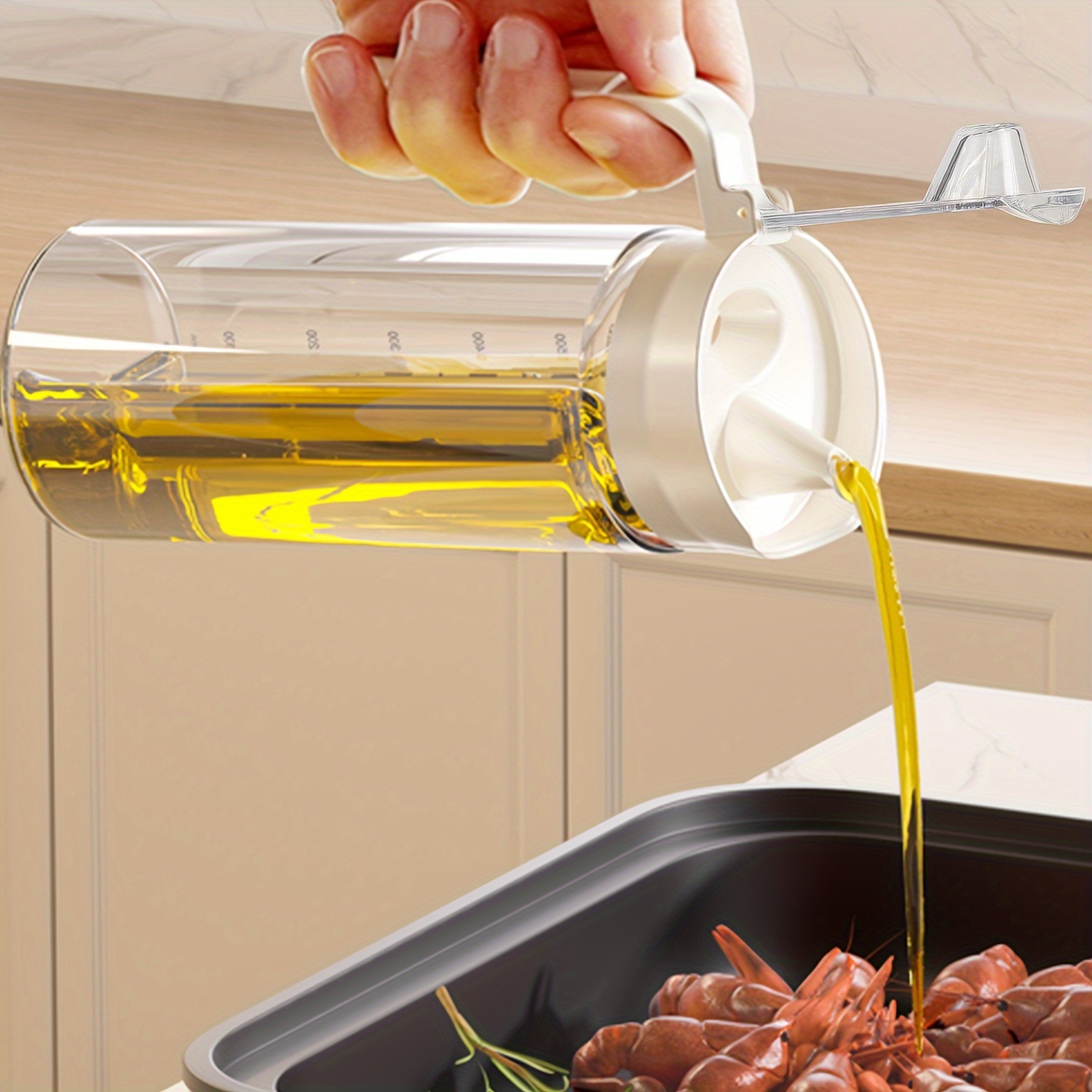  Dispensador de aceite de oliva - Botella dispensadora para  cocina con tapa medidora, recipiente de aceite de cocina, 17 onzas : Hogar  y Cocina