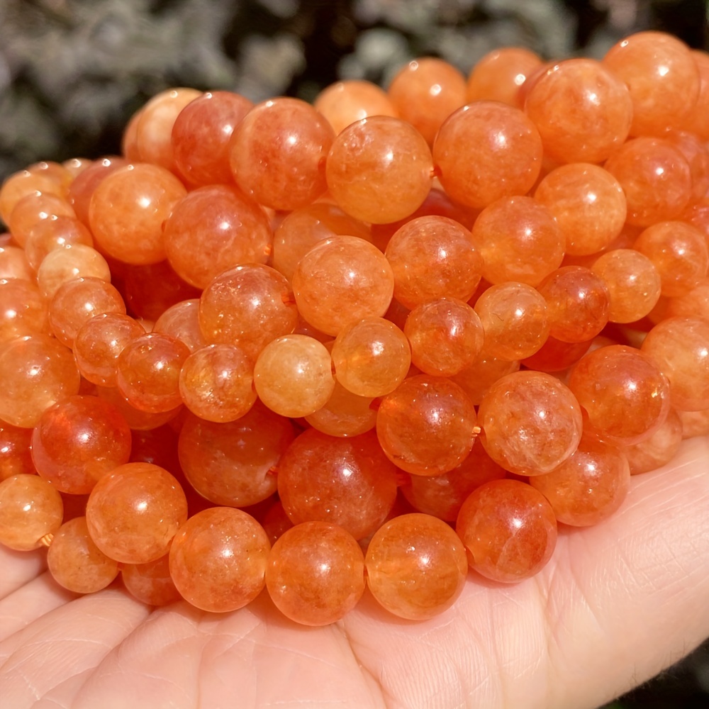 Perles pierre naturelle angélite 10mm orange/rouge
