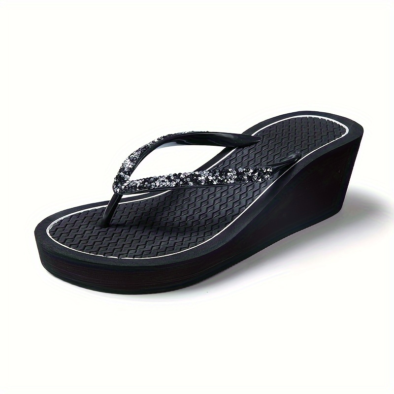 Guess black wedge flip flops on sale