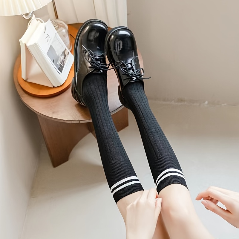 Medias y calcetines negros de mujer