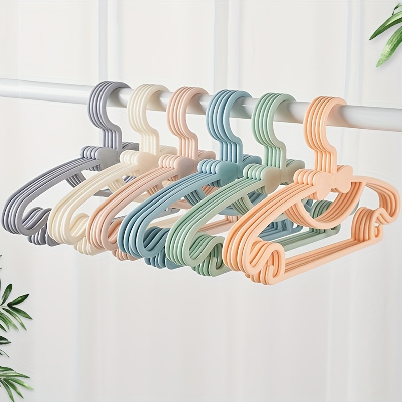 Portable Kids Clothes Hanger Plastic Household Baby Coat Rack Thickened Bow Coat  Hanger Clothing Organizer - Temu