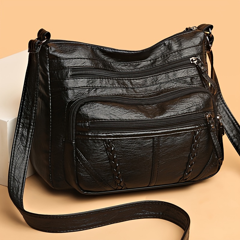 Pocket leather crossbody bag