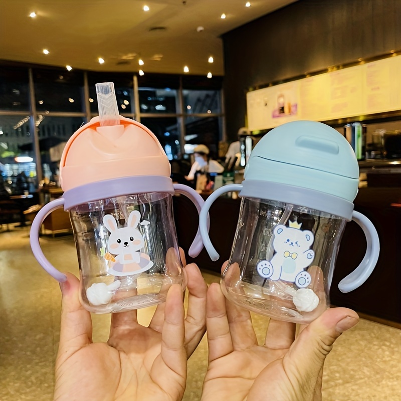 

1pc 250ml/8.45oz Cute Straw Water Cup With Double Handles, Anti-choking Leakproof Straw Water Bottle, With Scale And Gravity Ball