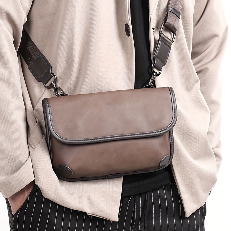 Avenue sling leather satchel