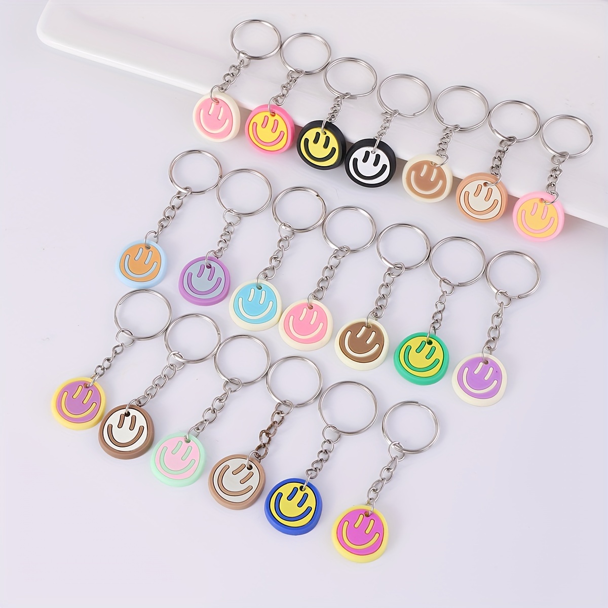 Image of 20pcs Pvc Face Keychain Cartoon Charms - Versatile And Cute Bag Accessories For S, Perfect Birthday Party Gifts
