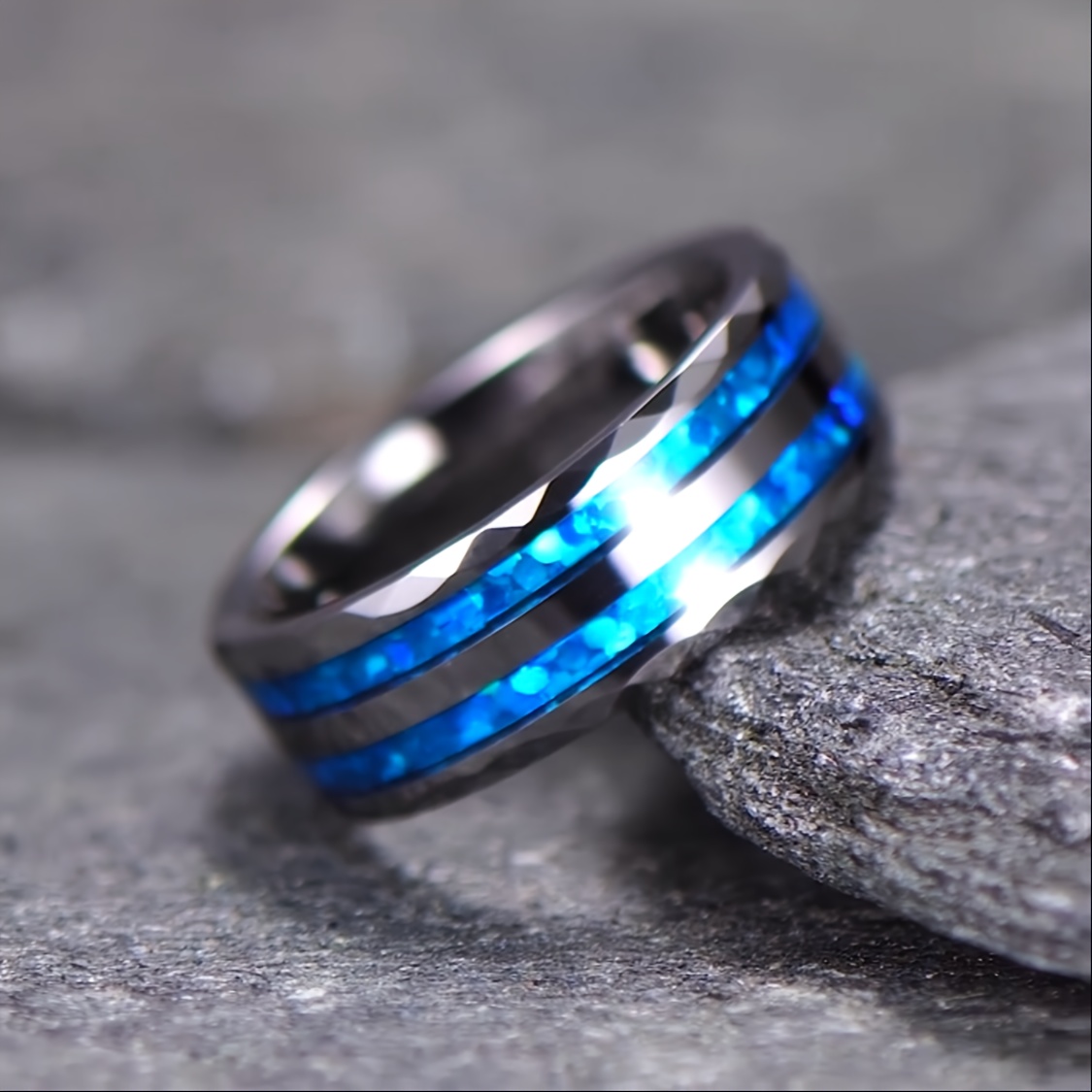 Blue steel ring with cuts on edges