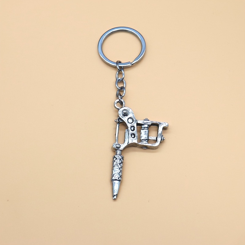 

1pc Creative Tattoo Machine Keychain For Men, Backpack Pendant