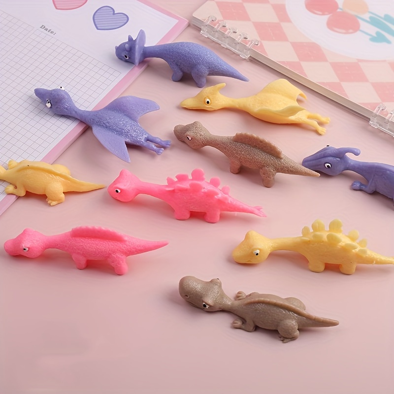 Dinosaure Finger Slingshot Toys Doigt étiré vol Dinosaure Jouet