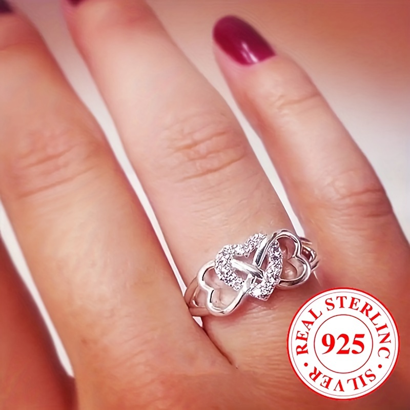 

Bague en argent sterling 925 avec un cœur étincelant + un design infini pavé de zircones brillantes Symbole de romance et de douceur Bague de fiançailles/mariage de haute qualité