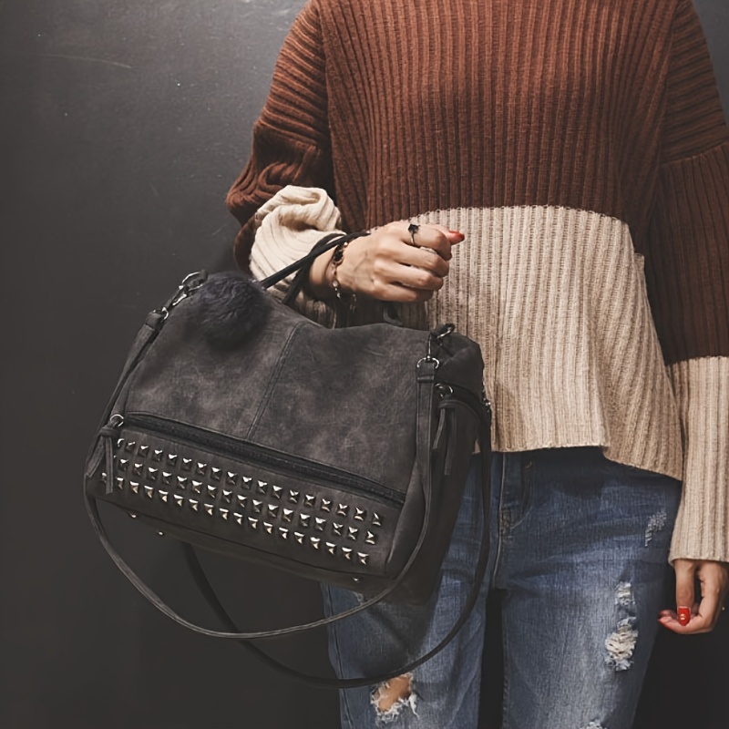 Borsa nera donna da lavoro con borchie e tracolla