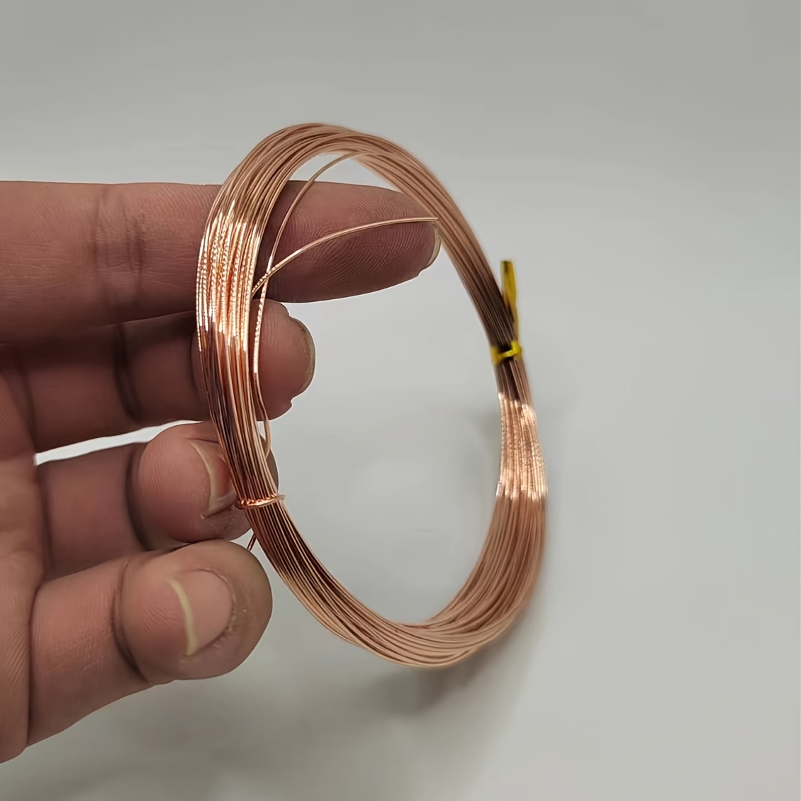 Wire, ParaWire™, titanium-finished copper, round, 18 gauge. Sold