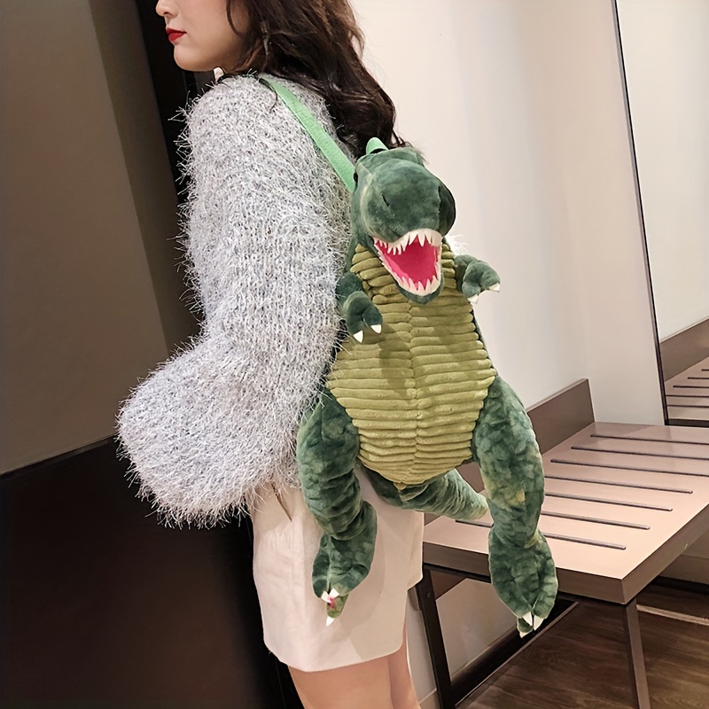 Dinosaur best sale shaped backpack