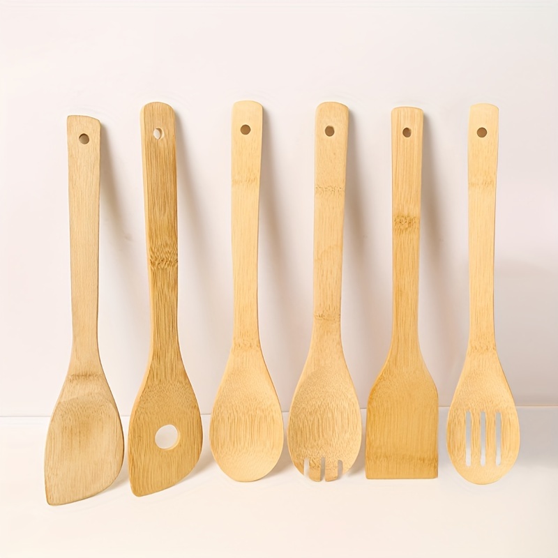 Cucharas de madera para cocinar con soporte para utensilios, juego de  utensilios de madera de 10 pie…Ver más Cucharas de madera para cocinar con