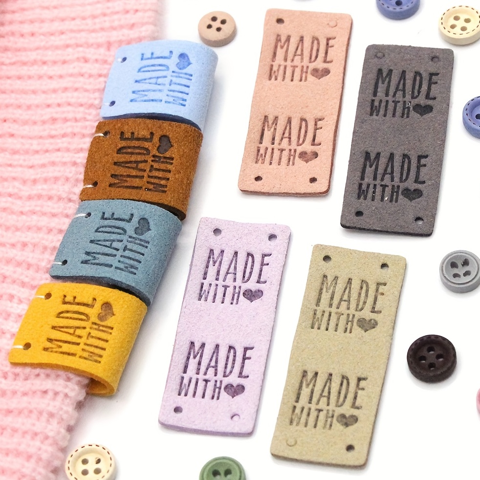 50 Pcs Faux Leather Label Handmade Tag Label Folding Handmade Tags Button  with Holes Embossed Tag Embellishment Knit DIY for Jeans Bags Shoes Hat