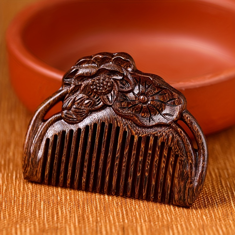 Carved wooden deals comb