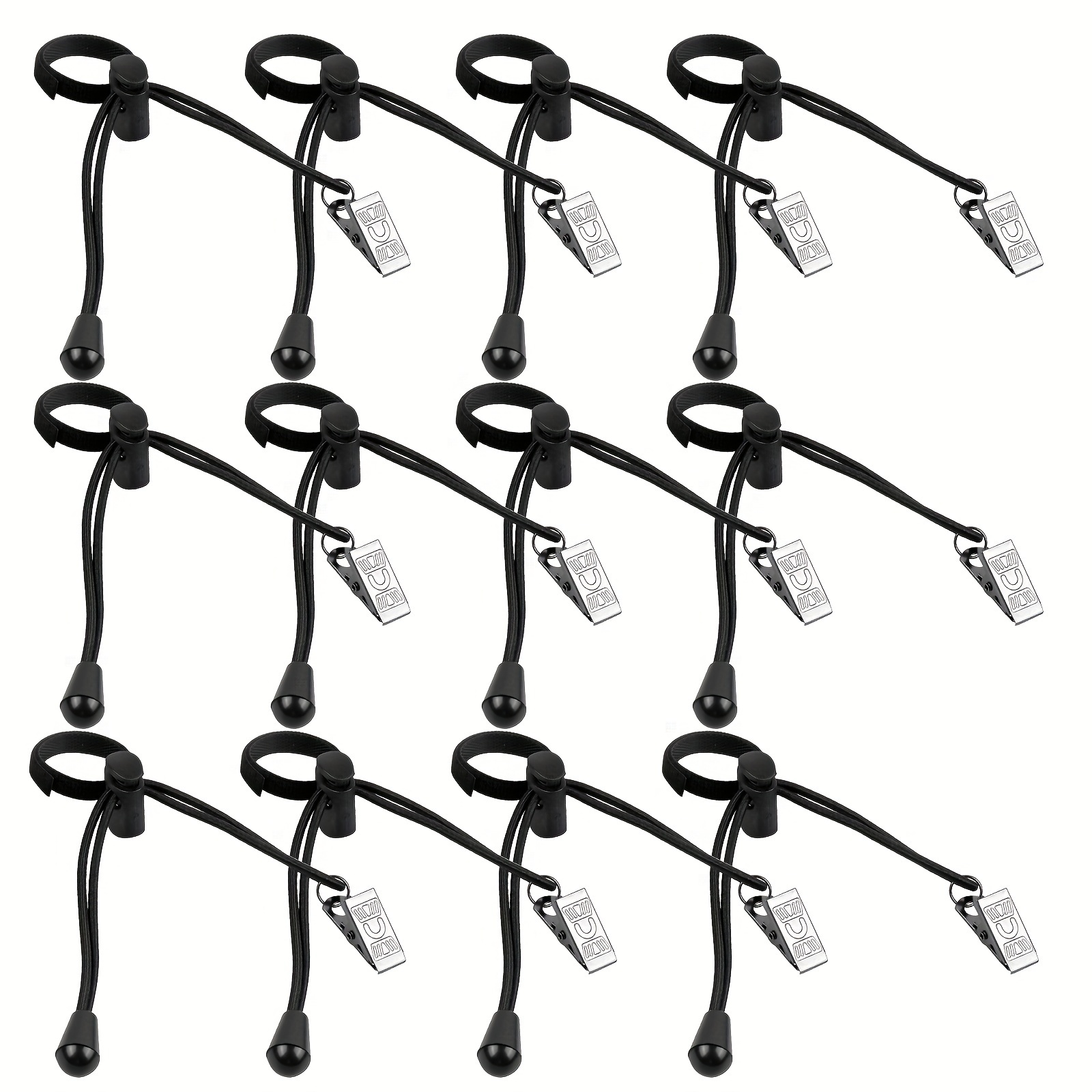 E-shop Ein Set aus 12 elastischen Clips für die Fotografie, häufig verwendet, um Hintergrundstoff zu sichern.
