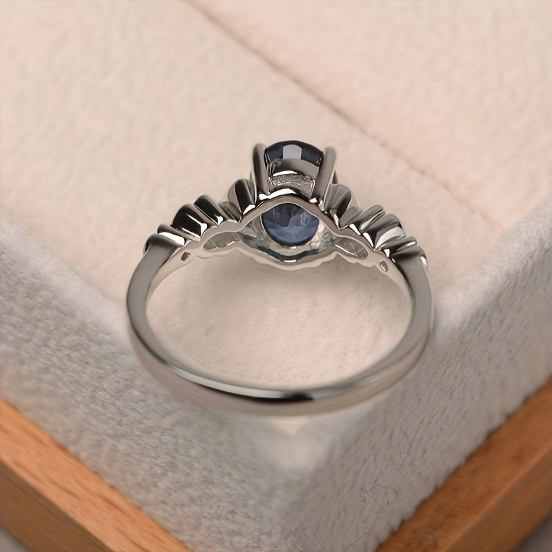 Women's Anniversary Ring with Oval Synthetic Gemstone