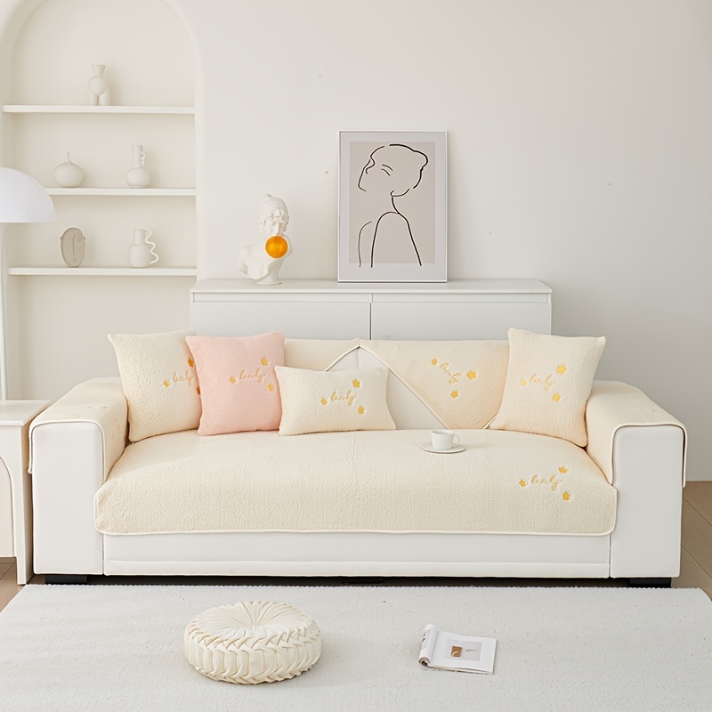 Cream sofa online throw