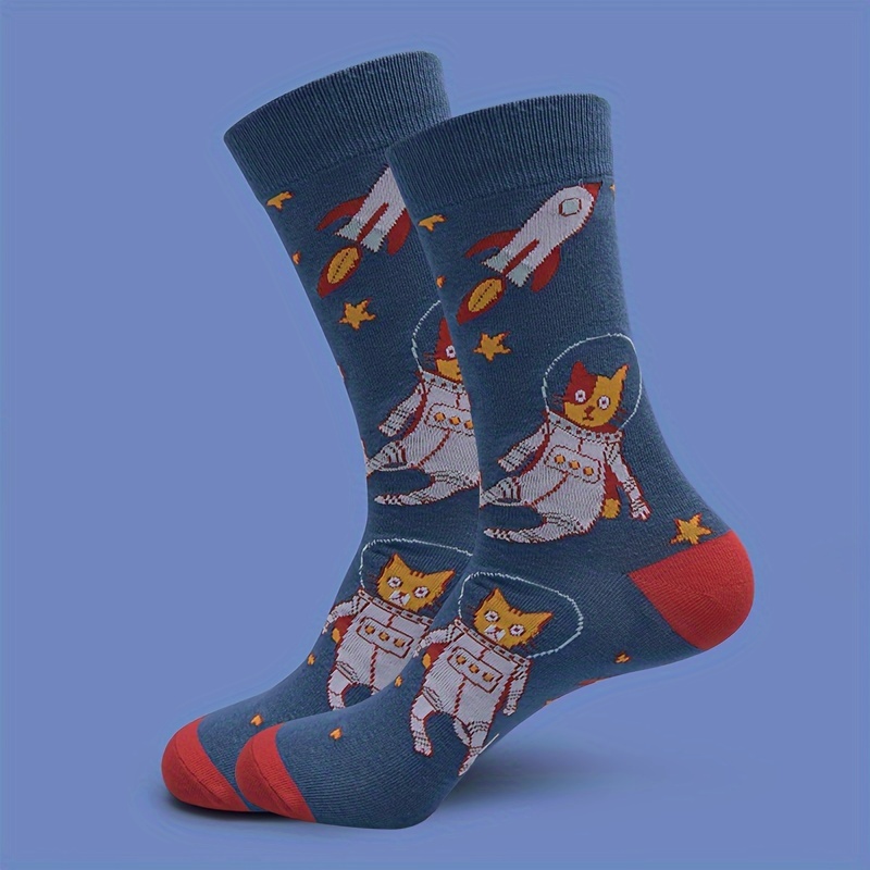 A Pair Of Unisex Socks Featuring A Trendy And Astronaut , Perfect For And Style