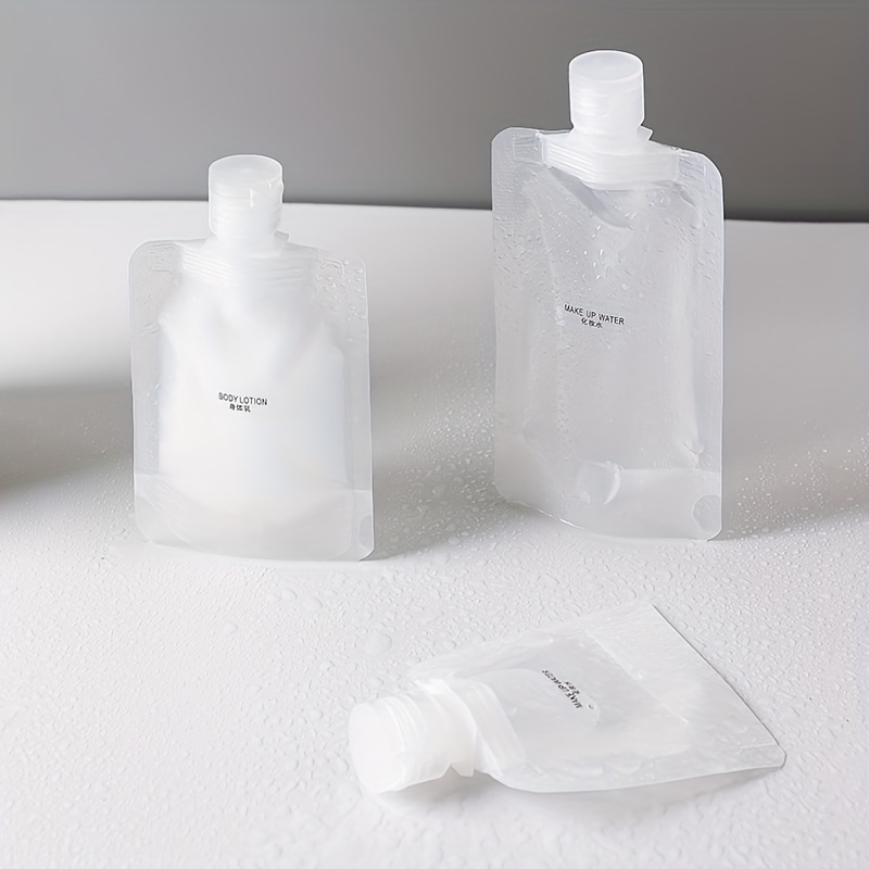 4 Pcs 1.01oz/1.69oz/3.38oz Portable Travel Makeup Packing Bag, Disposable  Lotion Sub-packing Bottle, Leak Proof Refillable Empty Transparent Dispenser