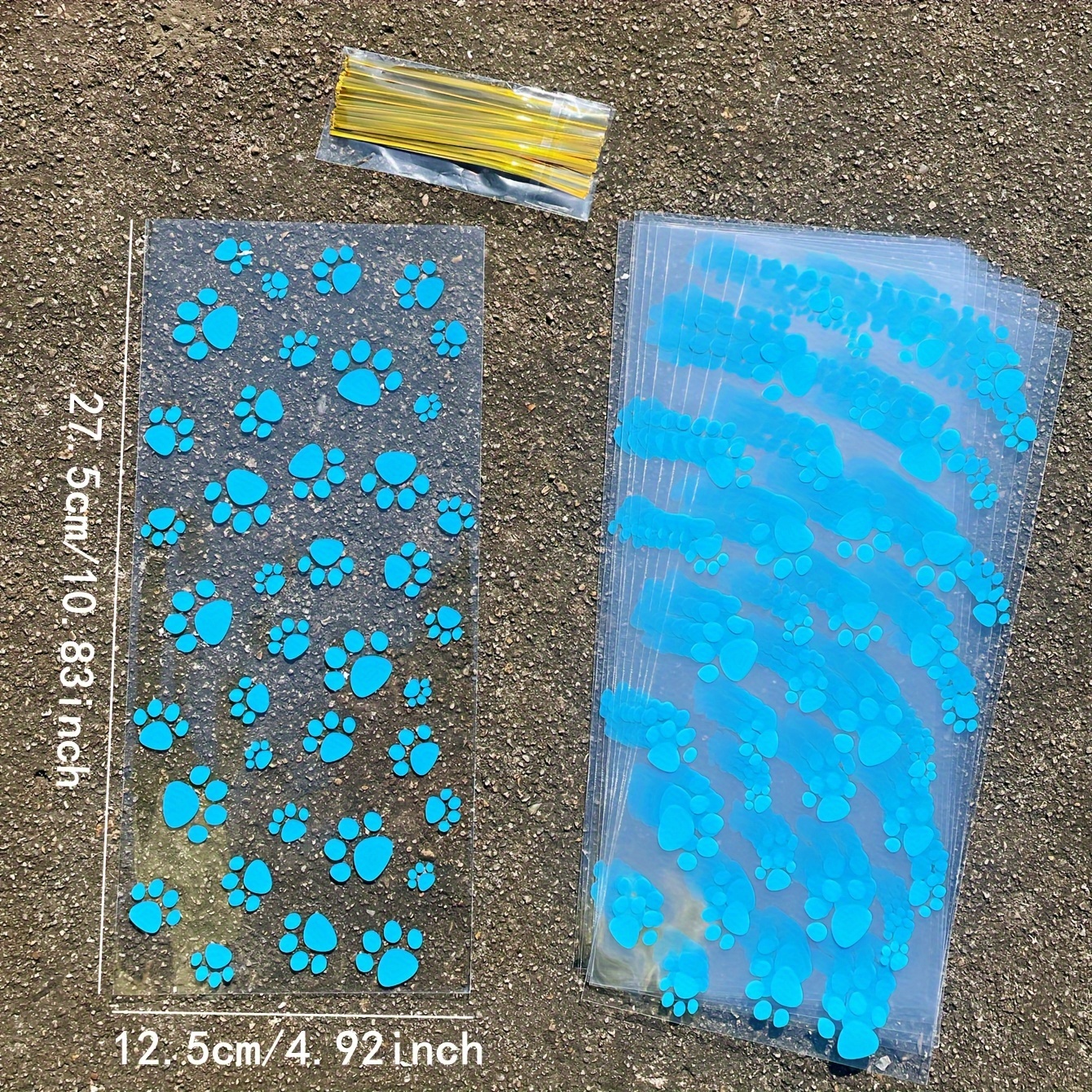 Image of 50pcs Cute Animal Footprint Opp Flat Bags, Blue Black Paw Print Pattern Printed Transparent Gift Candy Decor Bags, With Golden Twist Ties, Suitable For Party Holiday Gift Packaging