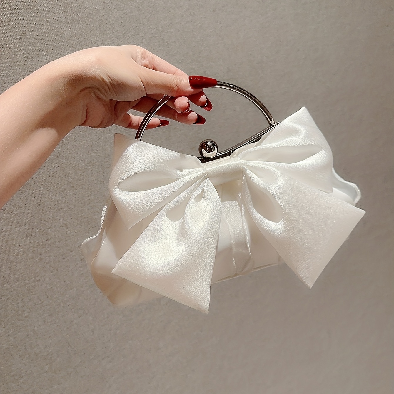 bow clutch purse