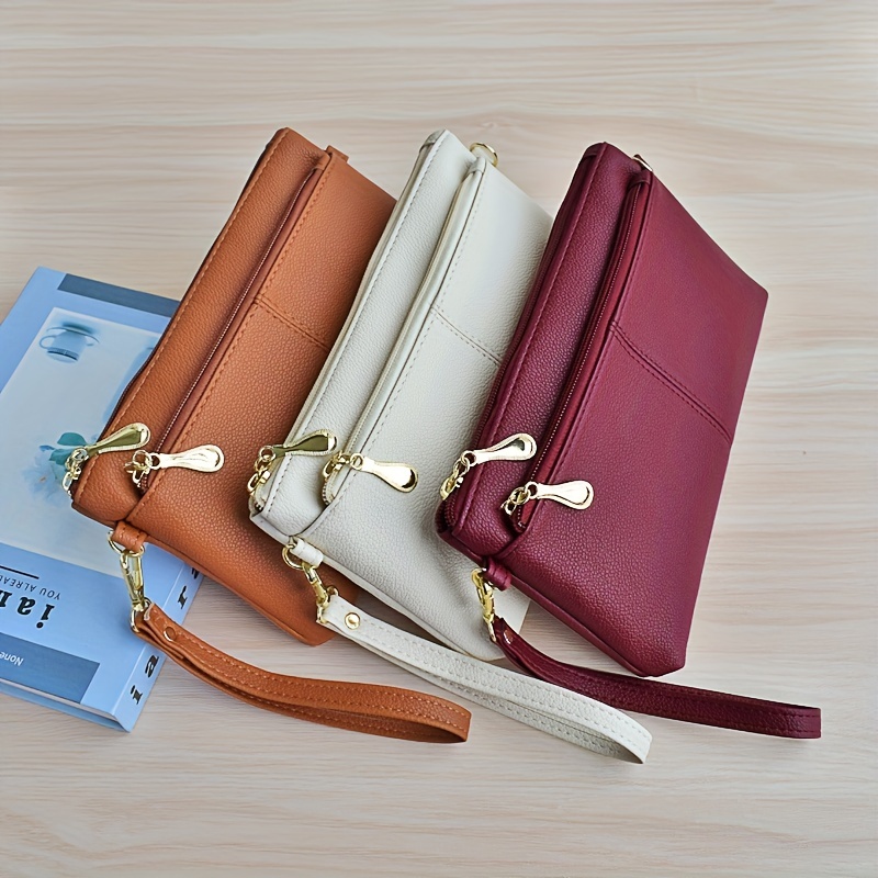 Deux Lux, Bags, Deux Lux Wirstlet Accordion Tassel Zip Wallet