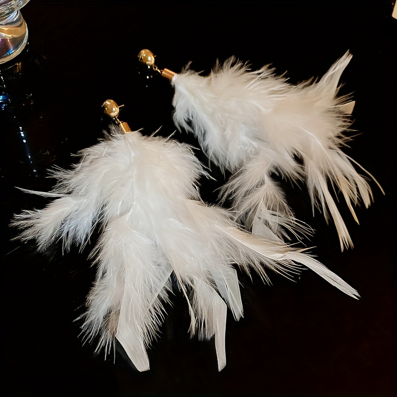 White ostrich feather on sale earrings