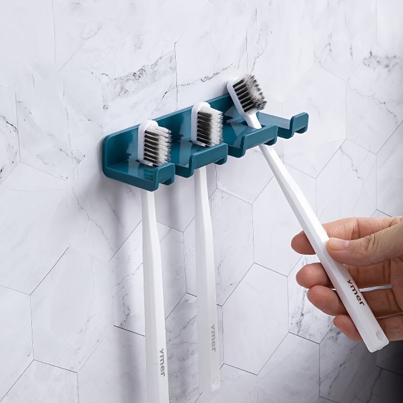  Soporte para cepillos de dientes montado en la pared con  cubierta para baño, organizador de almacenamiento de cepillos de dientes  con 5 ranuras para ducha, estante autoadhesivo para dormitorio, : Hogar