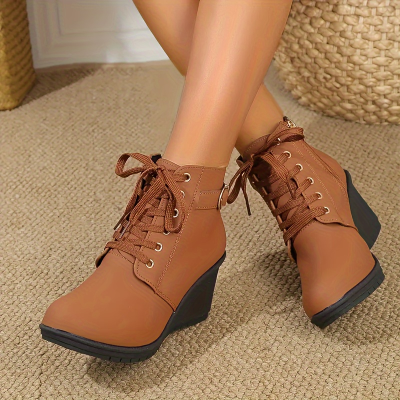 Brown wedge hotsell heel boots