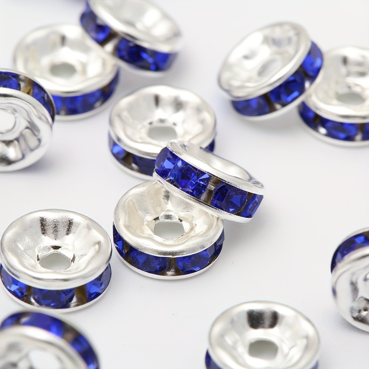 Small blue rhinestone buttons