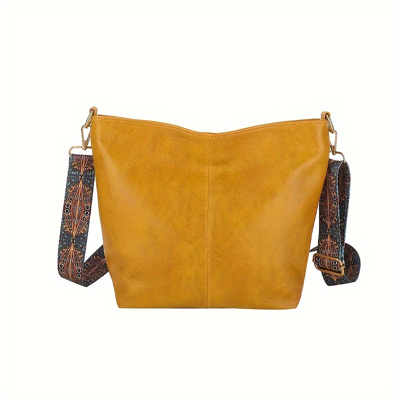 The Sak golden yellow Mustard Braided Strap Shoulder bag