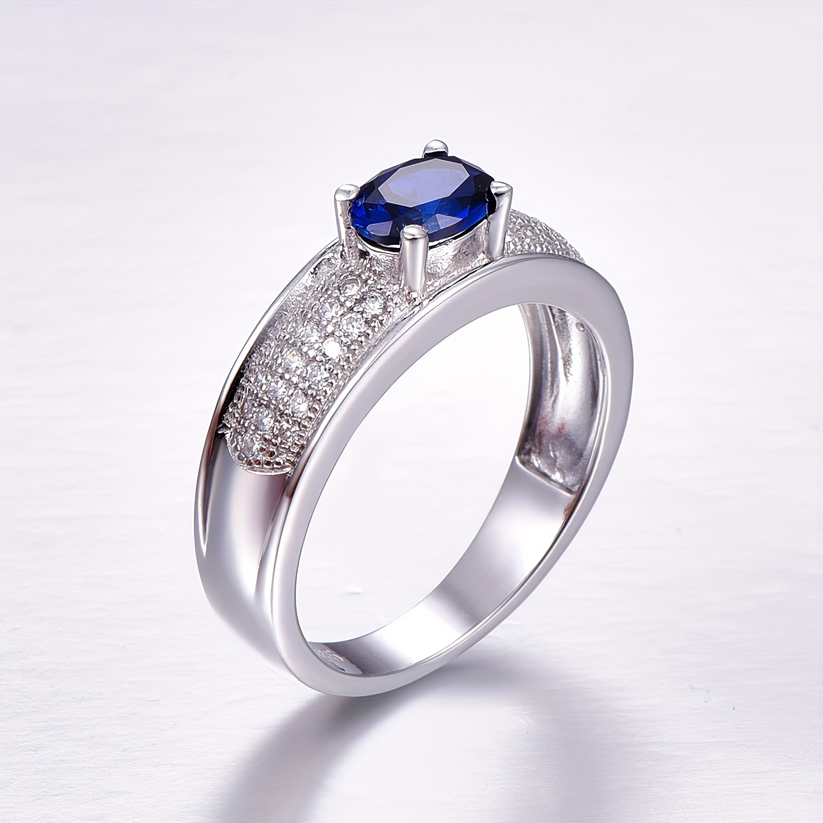 Synthetic sapphire deals engagement rings