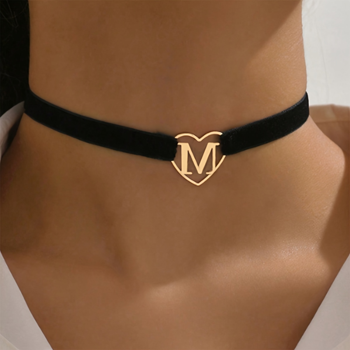 Image of A Fashionable And Minimalist Black Letter Choker Necklace For Women, Featuring A Simple And Design
