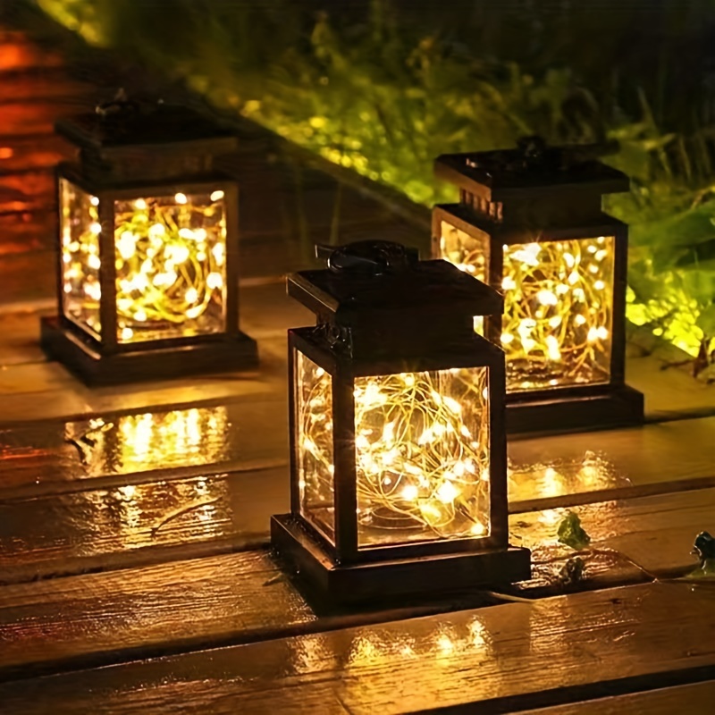 Comprar Linterna Solar LED Vintage, linterna colgante para exteriores,  luces nocturnas para acampar con energía Solar, paisaje decorativo para  jardín, Patio, camino